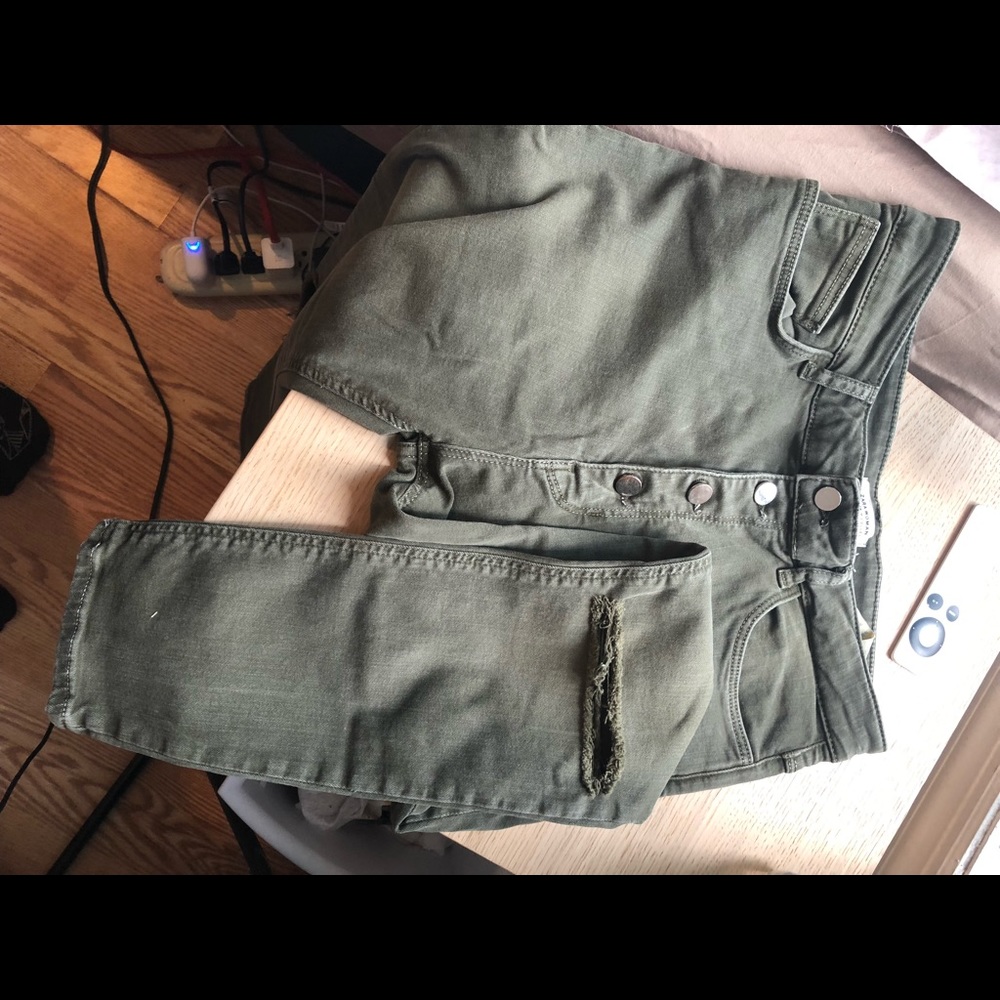 High waisted army green button fly skinny jeans